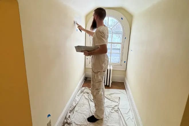 Asia Engineering & Construction carpenter installing custom woodwork in Singapore